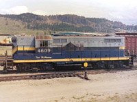 During one of my many trips through I detoured off the highway & over to the rail yards. This time spotted CN 4609 sitting there. I knew that this was an old NAR unit by it's colors, & I knew that it was a rare site in the Kelowna area so I took 4 photographs of it. Three from ground level, & this one from the top of a little hill. How long it stayed in BC or on CN's roster I have no idea, but it's name means more today then it did then.