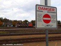 Last week I headed to Nanticoke to try and get some photos of the 'local' switching cars at the Imperial Oil refinery. Not only did I walk away without a good photo of the train...but again, came away with another warning. After some photos I have seen on rp.ca recently, as well as remembering some risks I have taken to get the great shot, I came across this photo I took last fall.
<br>
<br>
With a forlorn CN 4784 sitting lonely in a surprisingly near empty yard, heed to the signs fellow rp.ca photographers! Stay safe.