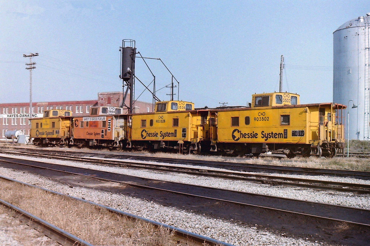 While I was on my way to Port Stanley to see the old tank cars used on the L&PS I stopped at the C&O roundhouse site to take a few photographs. As per my luck I drove all the way from BC only to find silence. There was not one locomotive in sight, so I photographed the vans, some M of W equipment, & the roundhouse.
