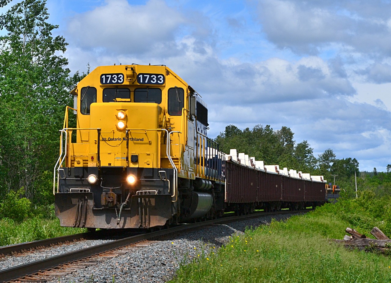 Train 308 hauls a short consist into Engleharts limits from Kidd Creek south of Timmins. 1733 is leading.