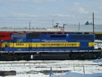 This SD40 was born in 1967 as CP 5548. It was acquired by the Dakota Minnesota & Western in 2000 and is shown painted in the special DME 20th anniversary paint scheme with the script on it's side reading: Dedicated to the employee spirit that saved and rebuilt a railroad,and now shapes its future.
