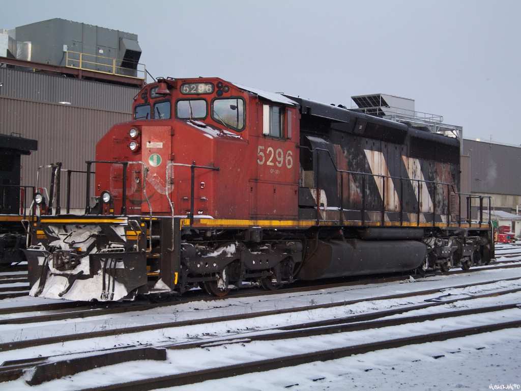 CN 5296 sits on the outbound tracks at the shop between assignments, a rare visitor to Mac yard. I only quickly glanced after my shift but if memory serves this unit would eventually go to North Bay on train 451 that night.