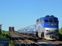 <b>Deadhead over the river.</b> AMT 1328 pushes a deadhead move over the St-Lawrence River, on its way to Candiac to bring more commuters to Montreal.