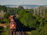 <b>A late CP 143.</b> A late CP 143 is through Pointe-Claire just after CP 133 passed, with CP 8751 & CP 8537 for power. The train is 100% intermodal, something which is rare recently as this train is almost always filled out with mixed freight out of Montreal.