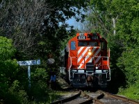 <b>Throwing the switch.</b> The conductor is throwing the switch so that CP 1608 can leads Exporail's excursion train to Hays Station to lay over after the last run of the day.