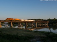 With light quickly fading SOR train 597 makes an early evening appearance in Caledonia with RLHH 3404 on the point.  Having noted an early running trend on the last few Fridays I rolled the dice and headed out to Garnet this evening.  The crew would come on duty shortly after 1900.  In this picture they are crossing the Grand River in Caledonia with the crew giving a good horn show.  It was an enjoyable chase with a friendly crew as well, a good way to end a busy week.