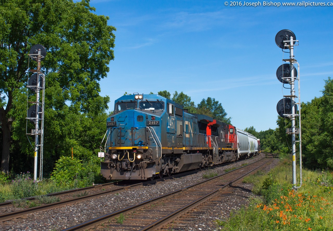 CN 394 splits the signals at Hardy Road with IC 2457 leading on a lovely June morning.  With the constant parade of GEVO's on CN lately this was an excellent train to shoot.