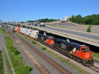<b>VIA's westbound and CN eastbound</b> CN 120 is eastbound on the freight track of CN's Montreal sub with CN 2905 and CN 2941 as head end power (along with CN 3000 mid-train) as VIA 33 heads west on the north track, to be followed in five minutes by VIA 53 on the south track. Not too long after VIA 605/607 and CN 149 will also head west on these two tracks.
