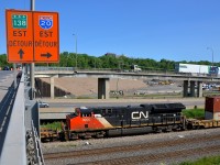 <b>Class leader DPU.</b> CN 3000, CN's first ET44AC, is temporarily stopped by the Angrignon overpass in Motnreal. It is serving as the DPU of CN 120. 