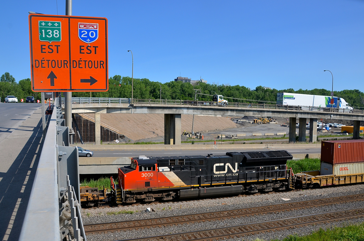 Class leader DPU. CN 3000, CN's first ET44AC, is temporarily stopped by the Angrignon overpass in Motnreal. It is serving as the DPU of CN 120.