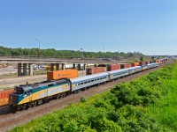 <b>Combined VIA train past CN 120.</b> The combined VIA 605/VIA 607 passes CN 120 near Turcot West.  The train will remain combined until Hervey Junction where the two trains go their separate ways (Jonquière and Senneterre respectively).