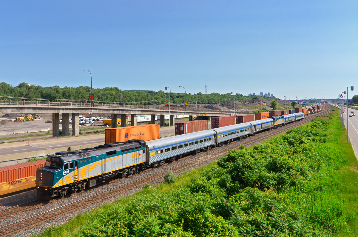Combined VIA train past CN 120. The combined VIA 605/VIA 607 passes CN 120 near Turcot West.  The train will remain combined until Hervey Junction where the two trains go their separate ways (Jonquière and Senneterre respectively).