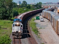 A pair of rent a wrecks lead the Herzog Ballast Train from Sudbury, Ontario. Both CEFX units were from the INRD and are being used as HPH payment to the CPR. Nice to hear some 16-645E3's once again.   