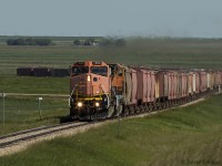 While it may look like a BNSF train, what we have here is a Great Western Railway crew operating on the Fife Lake Railway in southern Saskatchewan. The GWR got a deal on a pair of Techno Toaster B40-8W's from the BNSF, and uses them in regular service. Today's assignment is to haul 65 Mosaic Potash cars south to Coronach for storage. The train ran west from Assiniboia on the GWR, then turned south on the Fife lake Railway, which the Great Western operates and maintains under contract. 