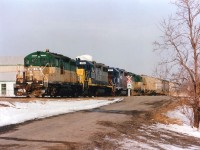 Try as I may, I just cannot warm up to the current GEXR colours as provided by the Genesee & Wyoming. That orange/black represents the G&W all over North America, and only the herald gives indication to just what road the locomotive represents. Back when it was RailAmerica, heck, anything could be expected. Something like this example of a Stratford-bound train putting everything together before it heads south. GEXR 179, HATX 176, 217 and GEXR 177. A lot of locomotives with little horsepower always makes for an interesting chase. The leasers are GP38AC and GP38-2 respectively sandwiched between the diminutive GP9s. All have long departed the GEXR.