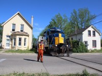 A shot that I've made many times is the one along the old Burford spur between the houses on Port Street. It is hard to believe this track once belonged to the TH&B. Now a spur that survives to serve a lone industry once a week. Ownership over the years has gone from TH&B to CP to CN to Railink then back to CN and now the SOR. These days the brakeman must flag all unsigned crossings.
