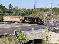 Northbound nose lit shots on the OBRY are somewhat hard to come by thanks to a morning departure time from Orangeville. The new James Potter Rd crossing in south Brampton is one of two locations where the northbound run receives some decent light. It won't be long before the newly planted trees block out the vantage point up on the hill. 