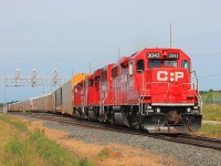 An early morning train of all Autoracks leaves the yard heading east with power from CP 3042,2263 & 3097.