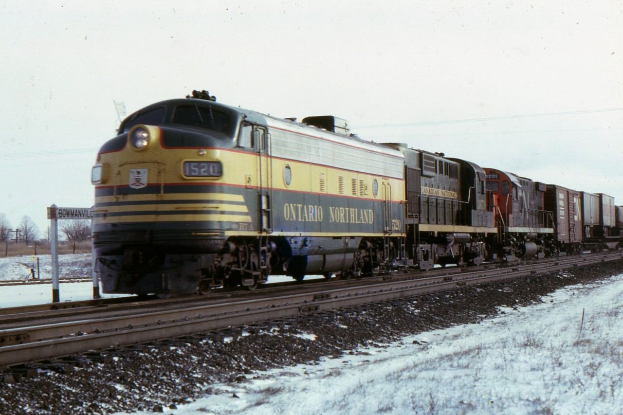In the mid 1960s CN and Ontario Northland pooled power between Toronto and North Bay. ONR units would sometimes wander a bit and here we see 1520 leading CN 3679 and CN 3201 thru Bowmanville on train 301 at 10:15 am January 19/66