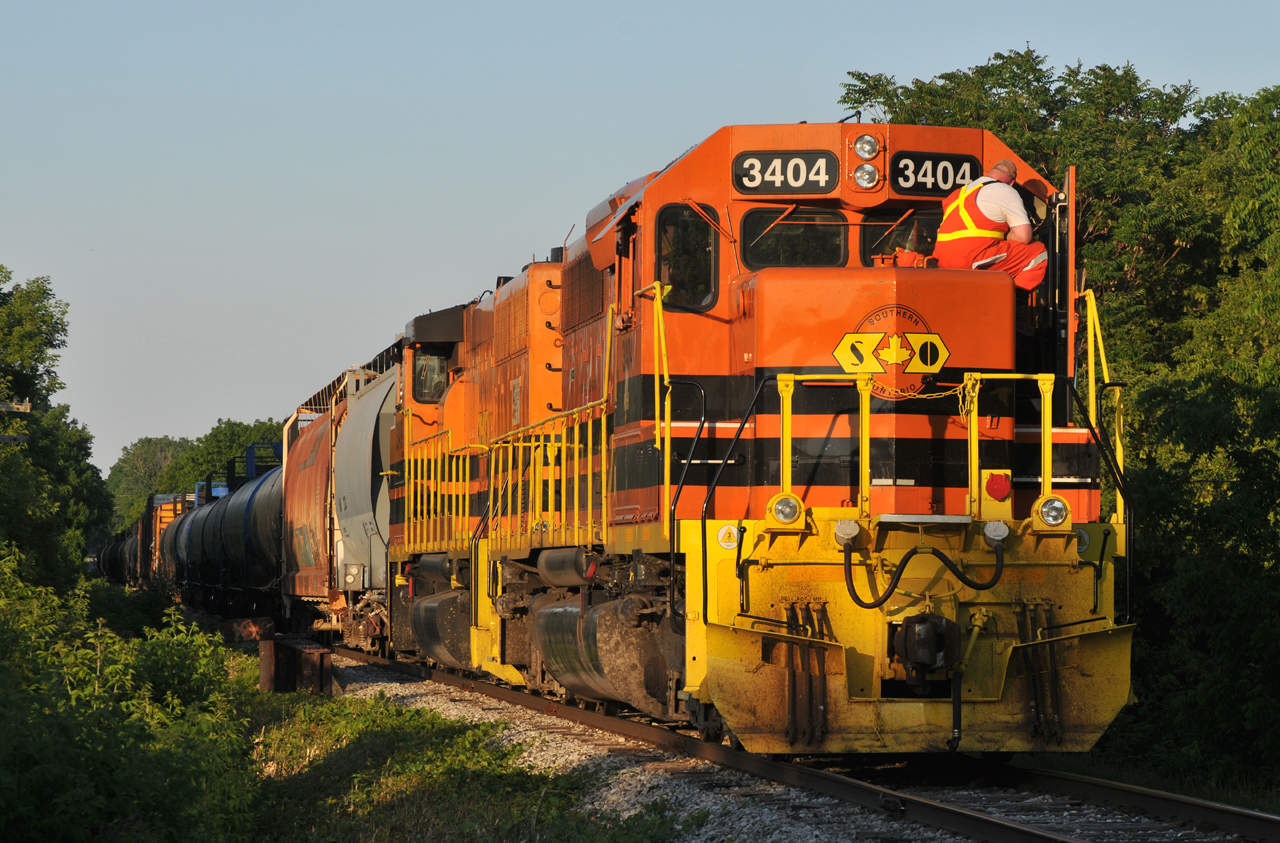 RLHH 597 sitting at Simpson with RLHH 3404 and RLHH 3049 and about 30 cars. It'll be 3+ hours before CN will finally clear traffic and give them a signal to Paris Jct