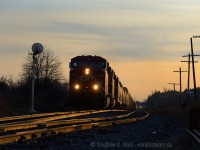 A lone sentinel guards the east switch Puslinch in its final months of service as the sun sets on a winter's day. This summer - these 1940's era sentinels will be gone as replacements are already erected.