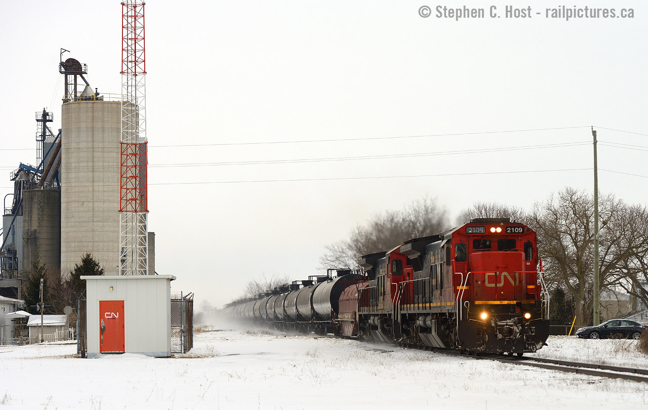 In response to Arnold's Wyoming shot in 1978 Here's what it looks like today, but well, from east of the 'station'. Not quite a time machine shot, but gives you an idea of what's changed, or not. I was enroute home from Sarnia with the family in tow, and we made one brief stop for this train. Glad I did.