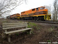 Have a seat, and enjoy the sights. At the neighbourhood the locals call "The Junction" a park bench awaits those that need a break from play at Goldie park in Guelph.
