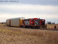 This will be a familiar image for OSR fans - but this was a very rare sight even then - for one day only, a CN SW1200 made a brief appearance on the CN's Ingersoll/CAMI Switcher job. This was my last shot of a working CN SW1200 until  over 10 years later when 7304 would make it back into service in Hamilton. Does anyone remember the symbol of the CN CAMI jobs? I don't ! Thank you in advance for any replies.


