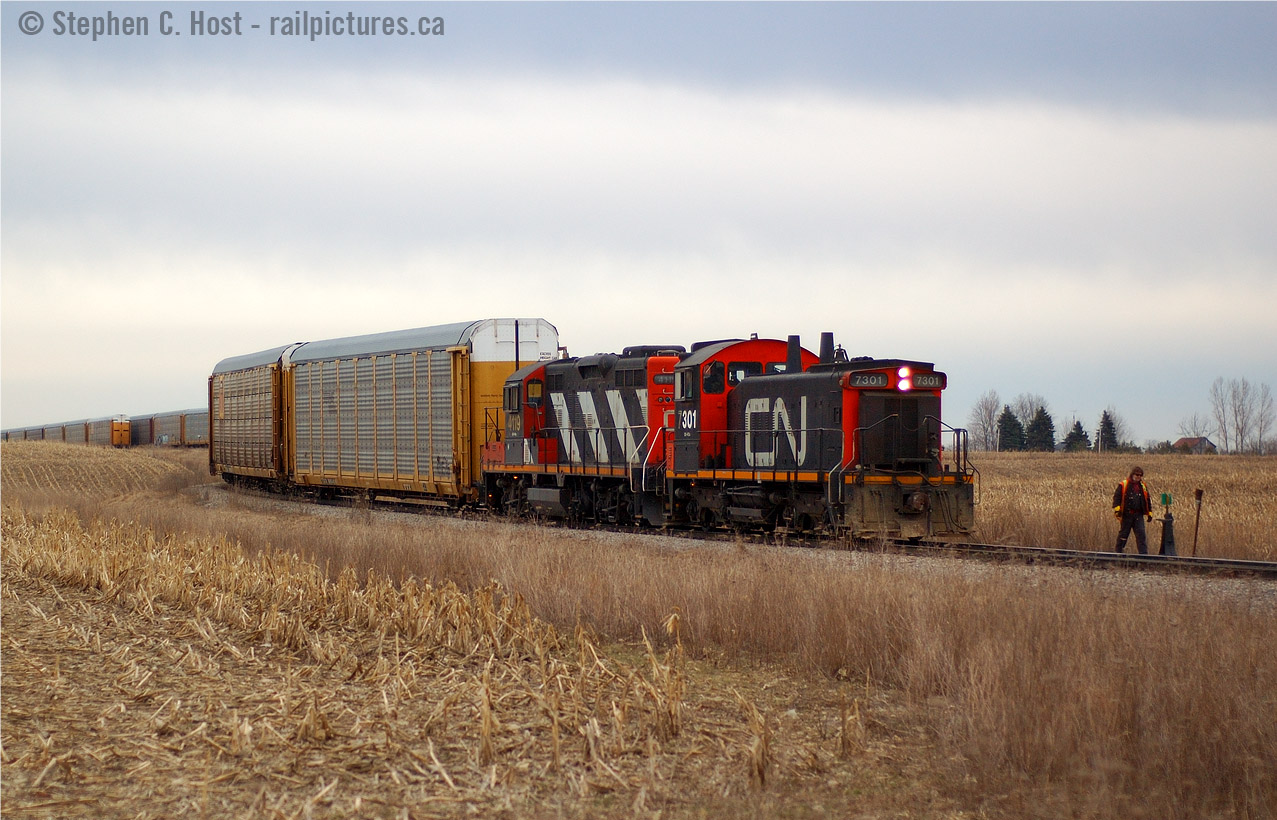 This will be a familiar image for OSR fans - but this was a very rare sight even then - for one day only, a CN SW1200 made a brief appearance on the CN's Ingersoll/CAMI Switcher job. This was my last shot of a working CN SW1200 until  over 10 years later when 7304 would make it back into service in Hamilton. Does anyone remember the symbol of the CN CAMI jobs? I don't ! Thank you in advance for any replies.