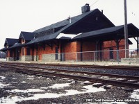 The Toronto, Hamilton & Buffalo Railway built their station in what once was the industrial area for Brantford. The tracks once served the many industries...while passengers would arrive or depart the birthplace of Alexander Graham Bell. 
<br>
Today, all industries that were once served by the railway are gone. The Casino sits in it's place. The tracks - although overgrown mainly by weeds now...are still in place. There is only a spur that the SOR services for one lone customer. But for how much longer? 
<br>
As for the station, it sat abandoned. Like many others in this position, it was vandalized and suffered fire damage to it's roof. However, it was saved - and became at one point the Iron Horse Restaurant. A new roof and addition to the back of the station doubled it's size. 
<br>
However, the station sits vacant again. There have been at least two more restaurants after the Iron Horse, and even a night club at one point occupied the station. All unsuccessful, much like most businesses in this area of Erie Avenue in Brantford. 