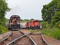 It's somewhat busy in the lower yard up in Guelph, Job One has arrived from the other end of Guelph after working Traxxside, PDI Massey Rd and the CN Interchange. The first job will set out 5 loads out from the CN interchange into Lower Yard One, 1 CN car from Traxxside to be weighed then brought back for the interchange to GEXR/CN, 2 plastic cars for PDI Elizabeth St, 1 Maleic Acid car for AOC and a PAO tank car from Chemtura in Elmira for the Liquid Yard. My assignment, Job Two sits and waits for the other job to finish before we continue to switch out PDI Elizabeth St. and then PDI Liquid.  