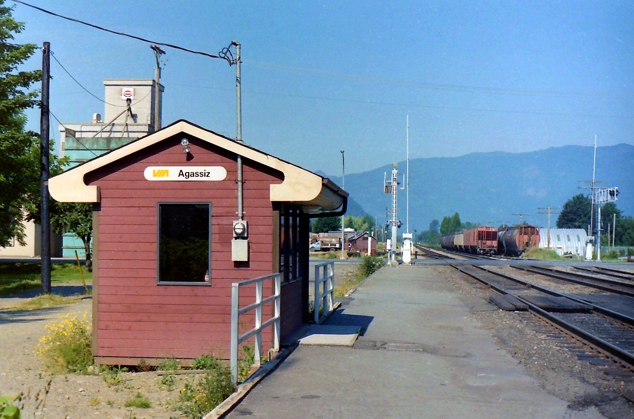 While living in Coquitlam BC my wife & I took a drive out to the Frazer Valley to see the sights. We eventually ended up in Agassiz with the intent of doing a little shopping, & looking around. In due time we came across this interesting little VIA station on the south side of the CP tracks so I took two pictures of it. Sitting behind the station were two people who were waiting for the train to arrive. With the exception some stations along the L&PS line in Ontario this is the smallest one I ever saw.