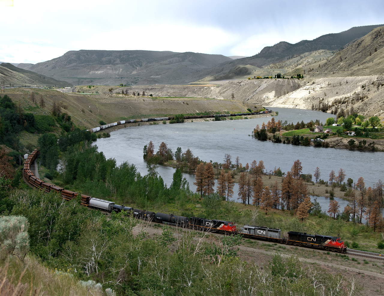 Eastbound mixed merchandise train 300 ain the semi arid Thompson River valley west of Kamloops