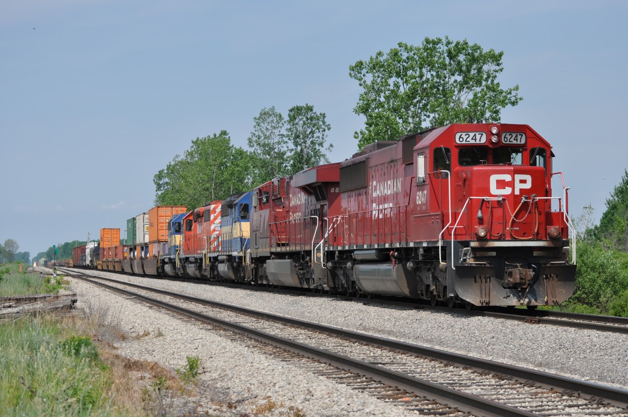 The CP has sold off a few locomotives as of late; 25 of them reportedly going to Larry's Truck and Electric of Ohio (LTEX), and they have been filtering their way down from the North to Welland this past couple of weeks. From what I gather, in most cases 246 brings them down, sets them off in the yard and in a day or three, 254 takes them Stateside. Here is an example; CP #246 with 6247, 8868 is about to back into the yard and set off DME 6362, ICE 6214, and DME 6083. These warriors are somewhat worn out: The 6083, a straight SD40, was built in 1966 as CP 5503. The others, both SD40-2s, ICE 6214 began life as CP 5682(1974)and DME 6362 once was MILW 198:2 (1974). What happens to them at LTEX is anyone's guess. I should add here that I know this is actually the community of Wainfleet lands, as the Welland city boundary extends only to a couple of KM to the East; but in all the years of being out along the tracks I have never heard this referred to as "Wainfleet Yard" so I continue to refer to the area as "Welland". We argue political correctness, now we can argue 'geographical correctness'. :o) And I further add; out of 612 contributions, this is only my third digital. Thoroughly Modern Mooney?  Not yet.