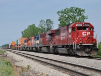 The CP has sold off a few locomotives as of late; 25 of them reportedly going to Larry's Truck and Electric of Ohio (LTEX), and they have been filtering their way down from the North to Welland this past couple of weeks. From what I gather, in most cases 246 brings them down, sets them off in the yard and in a day or three, 254 takes them Stateside. Here is an example; CP #246 with 6247, 8868 is about to back into the yard and set off DME 6362, ICE 6214, and DME 6083. These warriors are somewhat worn out: The 6083, a straight SD40, was built in 1966 as CP 5503. The others, both SD40-2s, ICE 6214 began life as CP 5682(1974)and DME 6362 once was MILW 198:2 (1974). What happens to them at LTEX is anyone's guess. I should add here that I know this is actually the community of Wainfleet lands, as the Welland city boundary extends only to a couple of KM to the East; but in all the years of being out along the tracks I have never heard this referred to as "Wainfleet Yard" so I continue to refer to the area as "Welland". We argue political correctness, now we can argue 'geographical correctness'. :o) And I further add; out of 612 contributions, this is only my third digital. Thoroughly Modern Mooney?  Not yet.