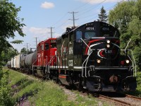 For now it appears that obry's new arrival is still being broken in as it travels with borrowed CP 2261. The train is seen about to cross Chinguacousy road in Brampton at one of the few decently lit northbound locations along the line to Orangeville.