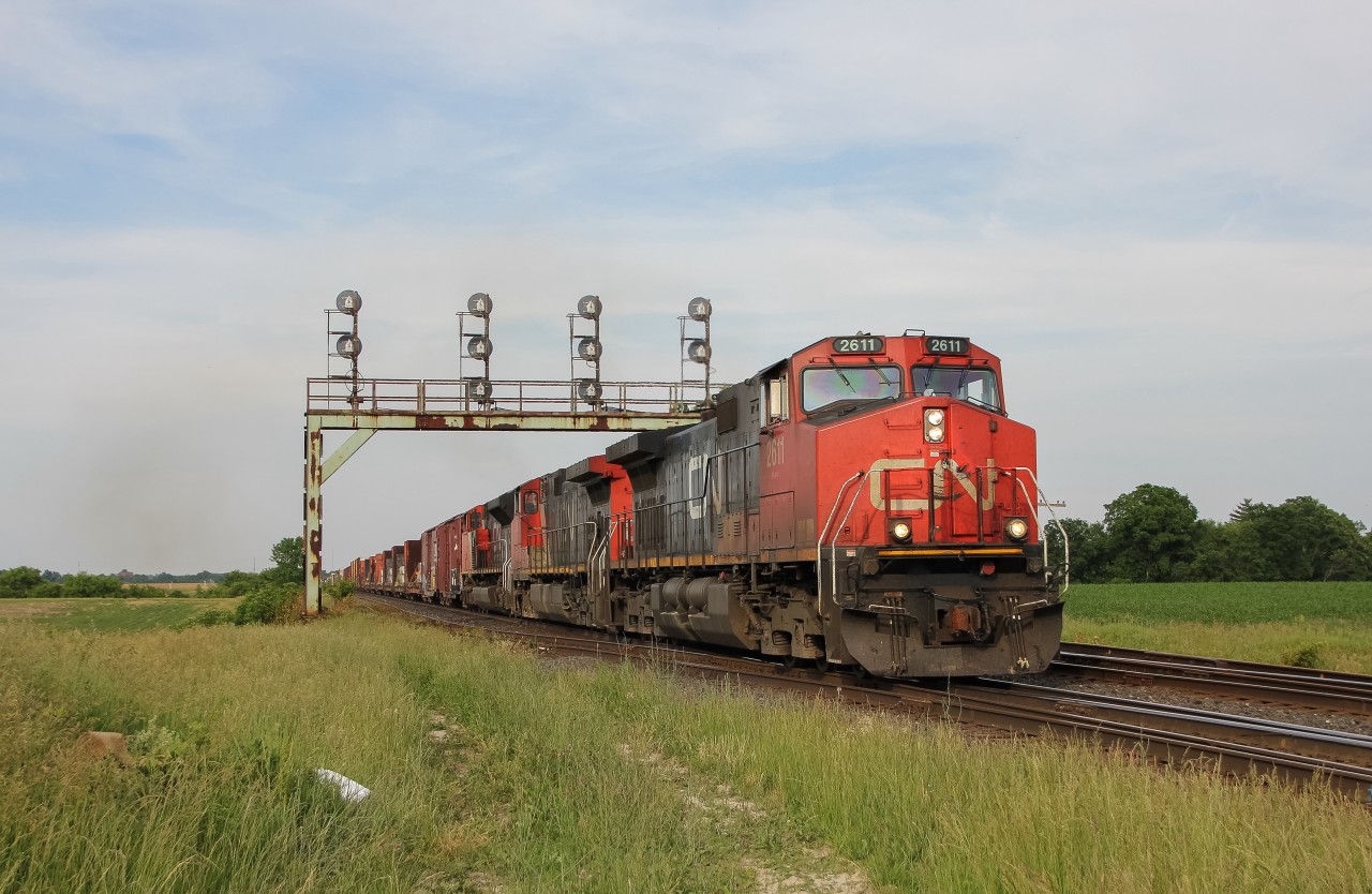 Minutes after X382 flew by on the south, 399 takes the north as it flies through Paris West on the Dundas Subdivision.