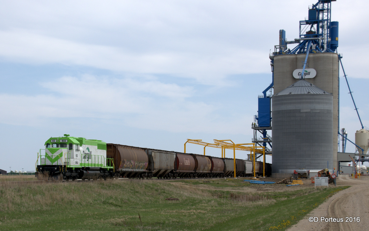 Cargill 603 shuffles cars, the frame work for the extended safety restraints is almost complete.
