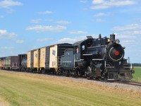 The fine folks at Waterloo Central Railway hosted a steam photo freight on June 30, 2016 and powered by Essex Terminal Railway No. 9.  ETR #9 is a 1400 h.p. steam powered 0-6-0 hand fired, coal burning locomotive built in 1923 by the Montreal Locomotive Works. Railfans rode and photographed the special steam freight consist at the Station & Restoration Shop in St. Jacobs before crossing the Conestoga River and heading deep into Mennonite farming country to the Waterloo Spur terminus in Elmira and return. Photo run-by location is in the midst of lush crops mid way between St. Jacobs and Elmira. 