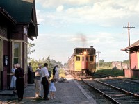 CN oil electric 15836 with trailer car C-1 is seen arriving at Caledon East on June 18, 1960. This is the same Barrie-Gerogetown-Hamilton train in Clayton Morgan's photo I posted earlier ,taken at Inglewood when it consisted of an SW1200, baggage car and coach. Special thanks to Ian for allowing me to share this historic gem.
This service was discontinued a few months later and 15836 was retired in 1960 as well.