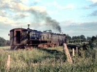 This is a going away shot of the same train Ian MacDonald photographed at Caledon East June 18, 1960 and I posted earlier. I thought the rare photo of trailer car C-1 was worth posting on it's own. Thanks again, Ian.
