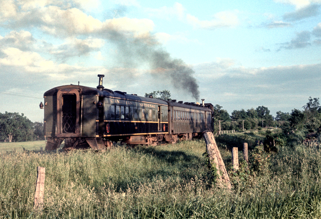 This is a going away shot of the same train Ian MacDonald photographed at Caledon East June 18, 1960 and I posted earlier. I thought the rare photo of trailer car C-1 was worth posting on it's own. Thanks again, Ian.