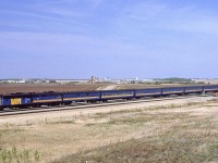After the eastbound "Super Continental" met its westbound counterpart at Bissell, the combined westbound "Super Continental" and "Skeena" get underway. ....and not one stainless steel car in the consist.