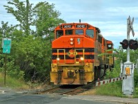 HCRY 3012 leads a very short train out of the yard in Sudbury westbound toward Copper Cliff, about to cross Regent Street at one of Ontario's wonkier road intersections - even by Sudbury standards! Within a 100' radius Regent intersects with Ontario St. and Riverside Dr. on the south of the tracks and Lorne St. on the north.