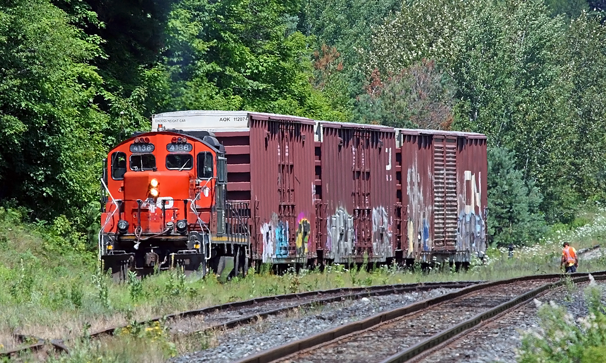 CN 4138 is the relief power for CN 595 - the Huntsville roadswitcher - this week, filling in for the usual 4132 while the latter is getting routine maintenance. 4138 still has the remains of the "AR Illinois" logo on its nose as applied for the movie "The Wrong Guy" with Dave Foley and Jennifer Tilly released back in 1997. I've heard people erroneously call this Geep the "40 unit" or the "AP unit" as missing paint/decal from the logo where access panels have been replaced over the years could make someone not familiar with the back story mistake it for either of those. I even had a CN foreman telling me a few years back on another of its relief missions - that time while 4136 was the "home" power for 595, "there's an IC unit down at Martins" because the Illinois lettering had him a tad confused. 4138 is seen here on the back track at Martins, about to back up the spur to the Panolam facility located there.