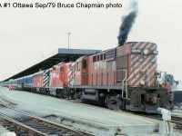About a year after the start up of VIA we see No. 1 at Ottawa in this photo by Bruce Chapman. From the puff of black smoke it looks like the engineer has just opened the throttle. A common complaint from engine crews, when they had an MLW with the long hood forward, was fumes in the cab. One has to wonder why the freshly painted geep was not put in the lead. 