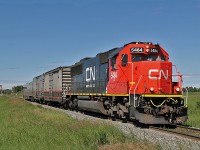 CN's engineers track inspection train is seen heading east from Lindbrook.  Headed by SD60, CN 5484, complete with "dash cam", followed by ATGMS test car CNA 515867, DGRMS test car CN 414852 and on the rear Dayliner 1057.