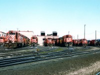 A visit on a "good" day to the CP yard in Agincourt 30 years ago would present us with enough power to drool (or should that be "foam") over. In this photo there must be upwards of 40 locomotives basking in the sunshine. In the days of film we could go broke just shooting slides/prints of them all. That is, if we were allowed to wander at will. But no, all photos had to be taken from along the roadway. Even that was great while it lasted. This view shows various switchers, GPs, MLWs, a smattering of Chessie as well as a few former Missouri Pacifics now lettered for GATX, which were on lease to CP around that time. Nowadays, don't even bother trying to go there...........