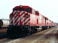 Red Barn-The Wall. So it looks, anyway. A dozen brand new SD40-2F locomotives sit at the CP Quebec St yard on a rather drab Monday afternoon. This is 12 of the 25 units built. Hard to believe they are being retired already, and sightings of what is left have been far and few between. Actually, I am not sure if any of them are out on the road anymore. In this photo we see CP 9002, 9006, 9014, 9023, 9018, 9007, 9012, 9003, 9009, 9000, 9005 and 9004. I had no problem wandering that day, but trespassing on CP property is now prohibited.
