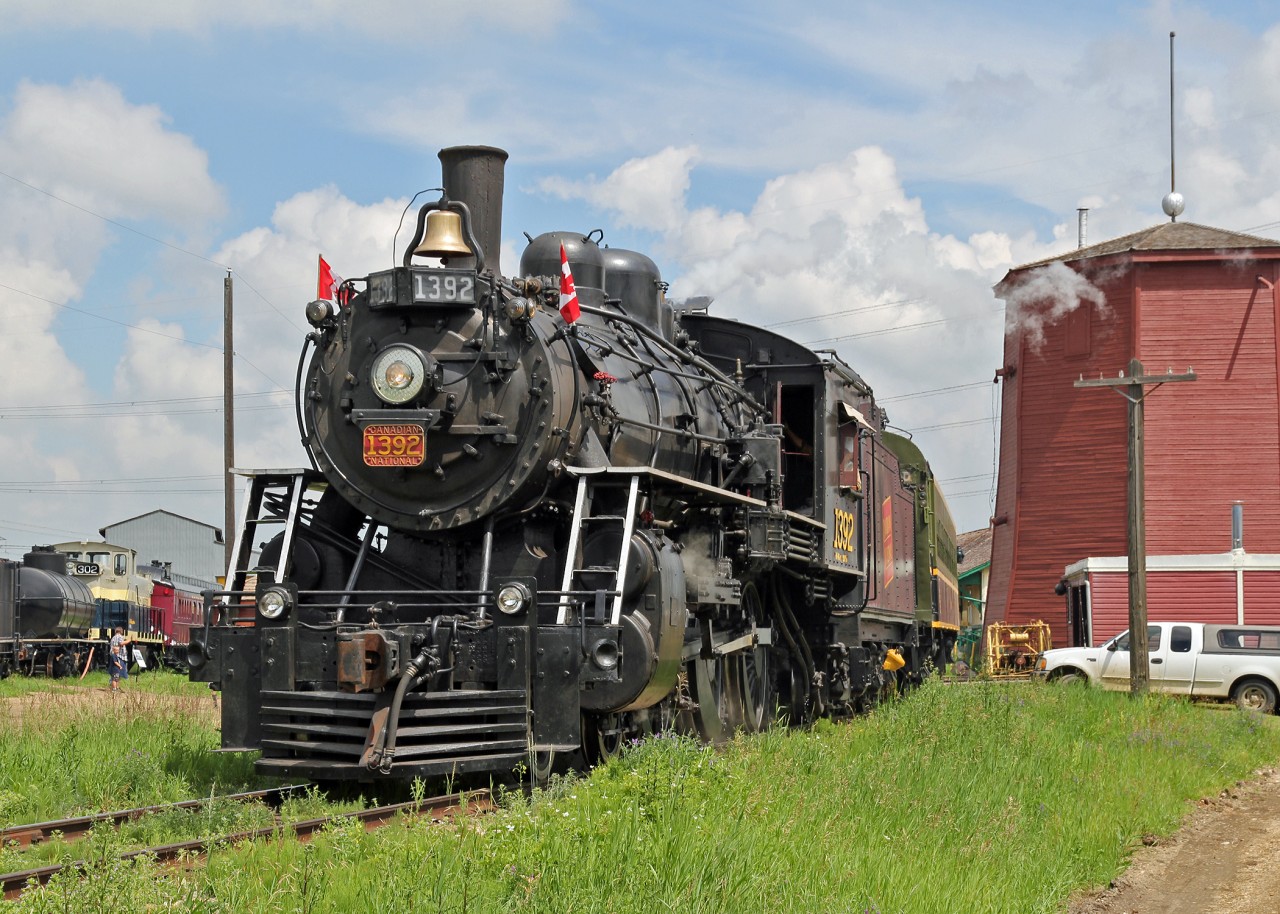 The museum's resident steam workhorse, CN 1392 is seen passing the 1919 Gibbons Water Tower. The locomotive is a 4-6-0 built by MLW in 1913 for CNoR and later absorbed into CN.